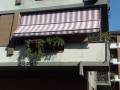 Tenda-da-sole-a-caduta-con-braccetti
